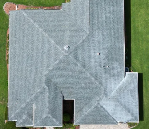 A residential roof after rejuvenation chemical treatment
