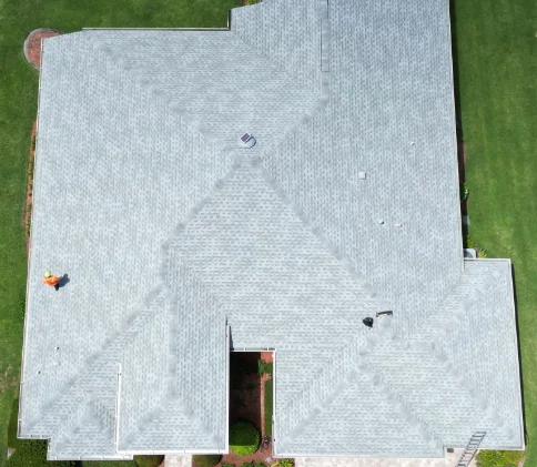 A residential roof before rejuvenation chemical treatment
