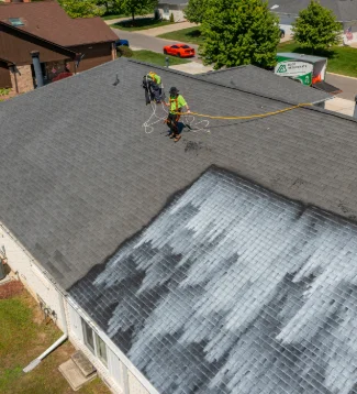 A roof in the process of Roof Rejuvenation Lancaster's chemical treatment